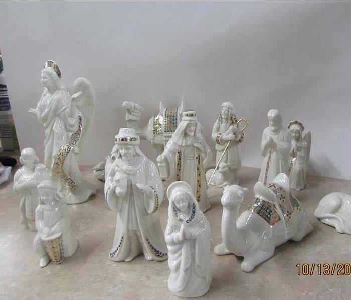 nativity set cleaned from soot